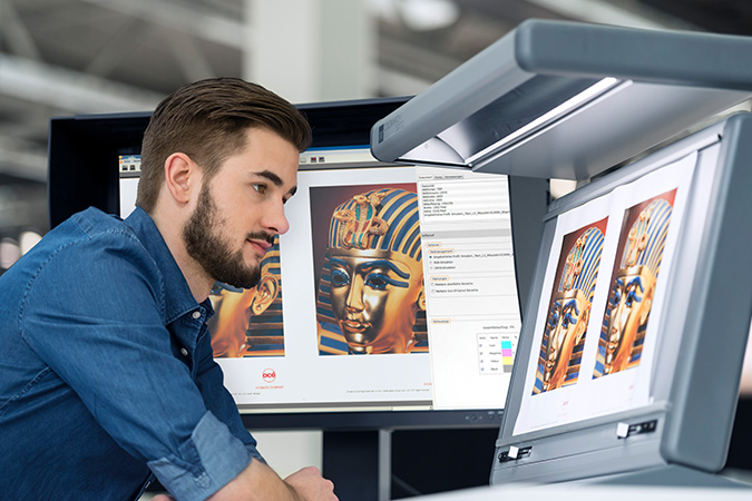 Image of TrueProof Prepress Proofing Software being used by a young man